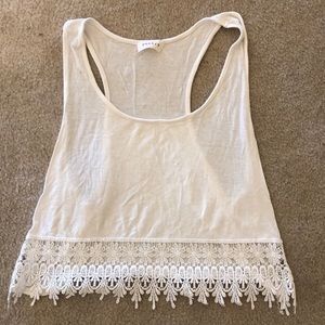 White, lace-trimmed tank top.